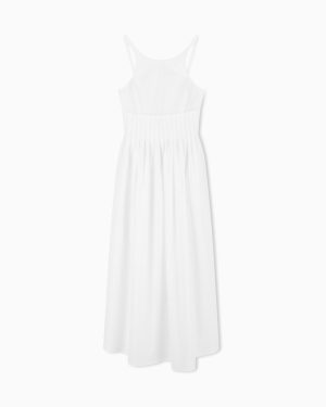 Long dress in poplin with smocked motif