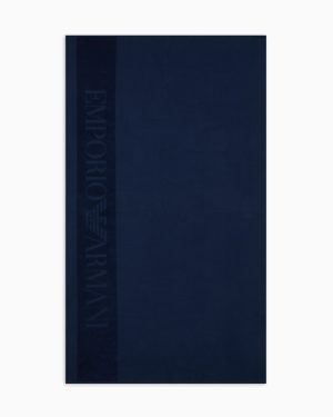 Waffle-weave beach towel with jacquard logo